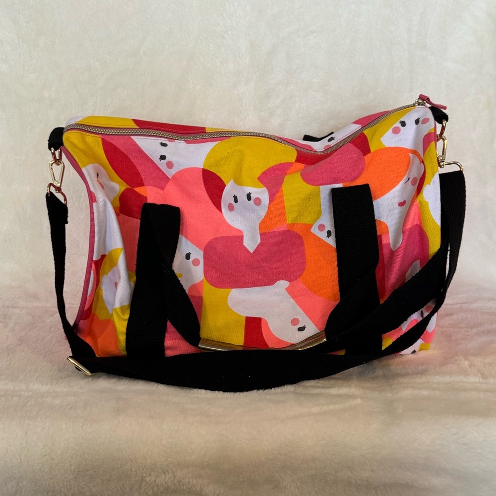 Benefit Pink and Yellow Small Duffle Bag
